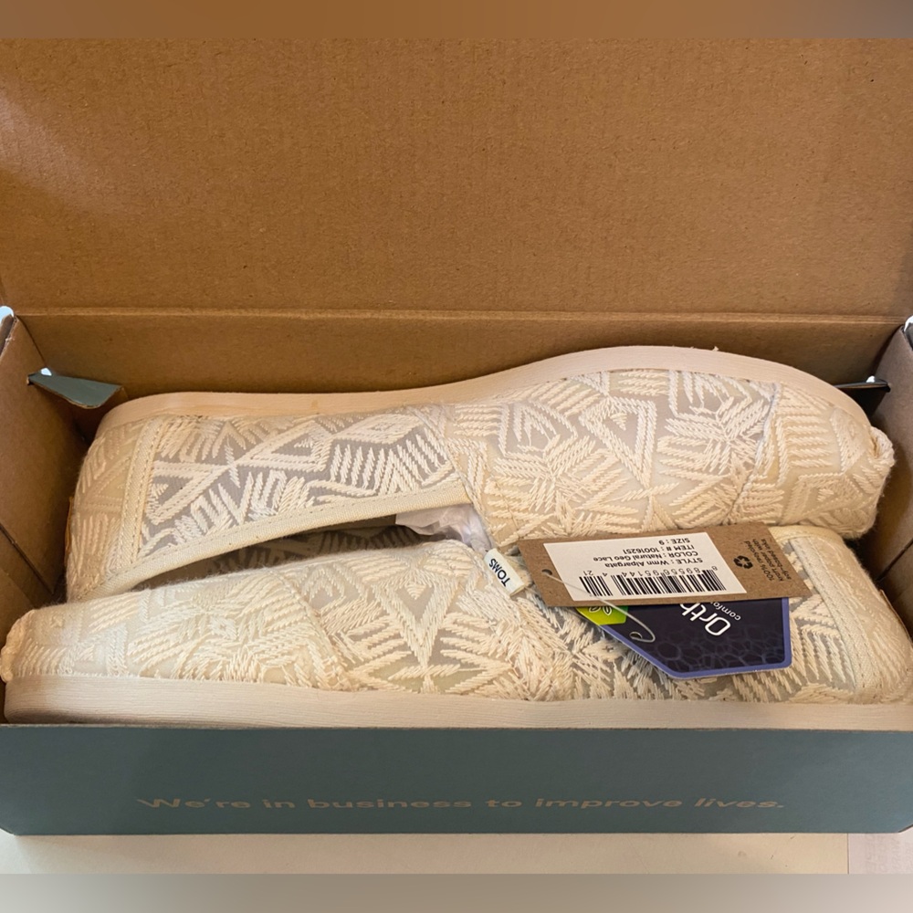 TOMS Ivory Geometric Slip-Ons